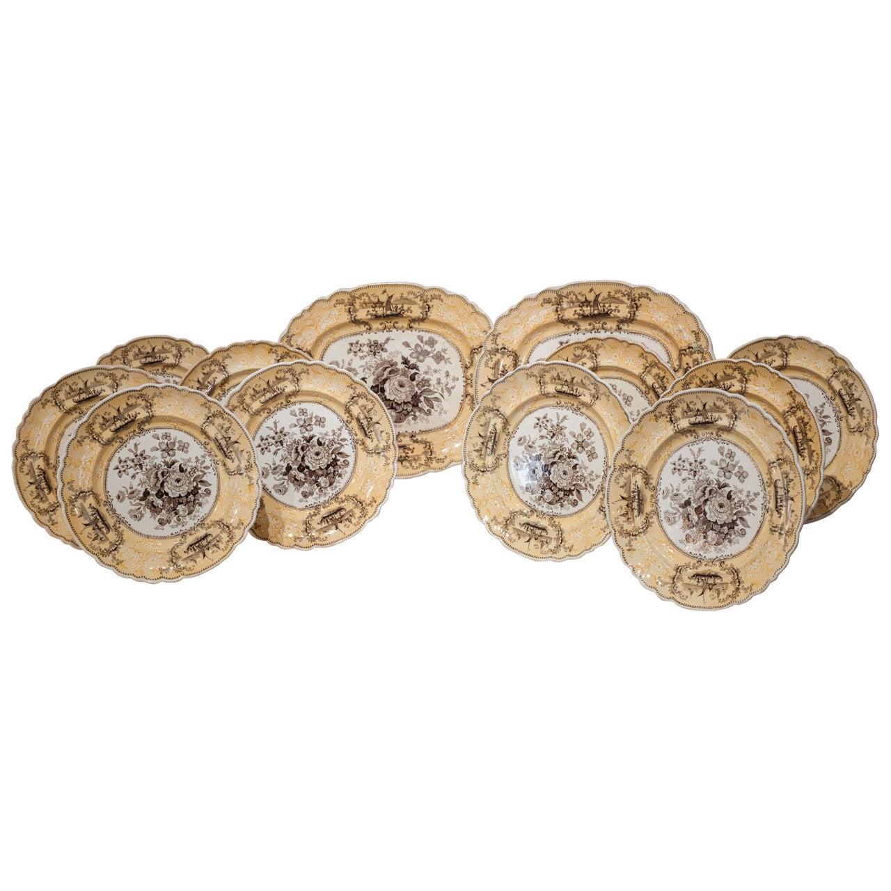 A set of ten yellow and brown transfer plates and two platters, 1840, England