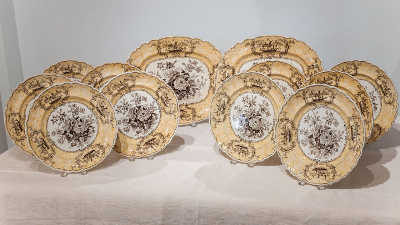 A rare of set of ten yellow and brown transferware plates and two platters in the Shiraz pattern by John Ridgeway, England circa 1840. The brown and yellow combination  is hard to find and much sought after. The pattern is named after a city in