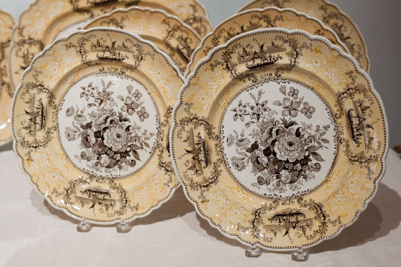 English A set of ten yellow and brown transfer plates and two platters, 1840, England
