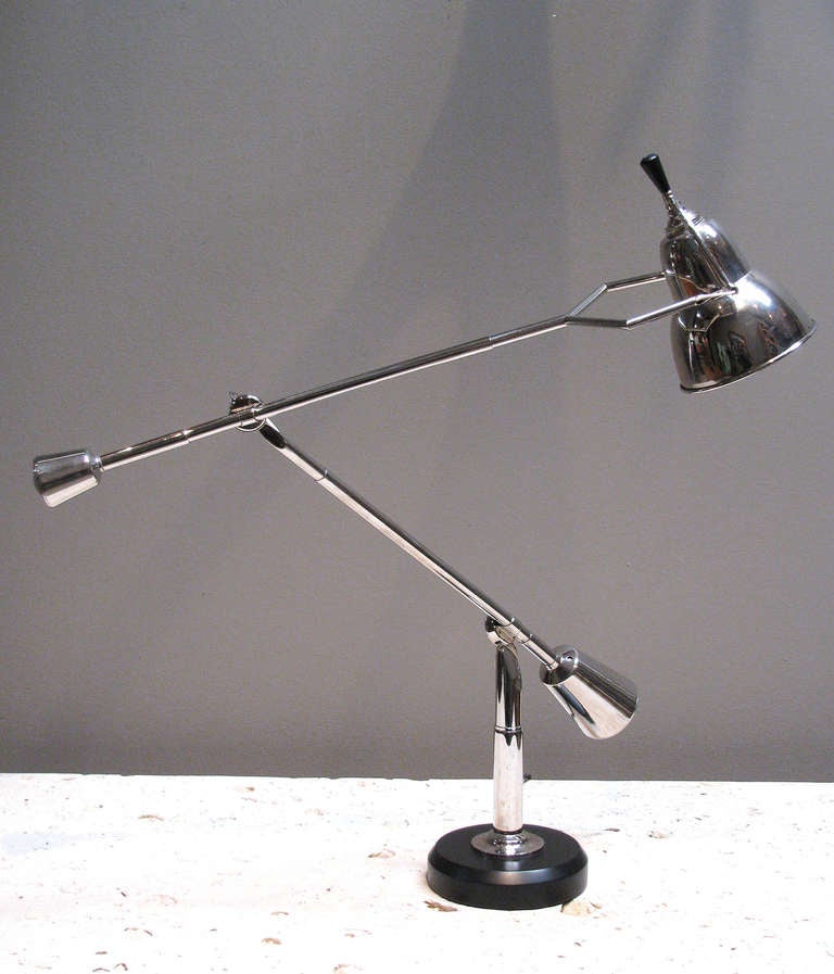 A rare counterbalanced table lamp by designer Edouard-Wilfred Buquet. This stunning example is referred to as the 