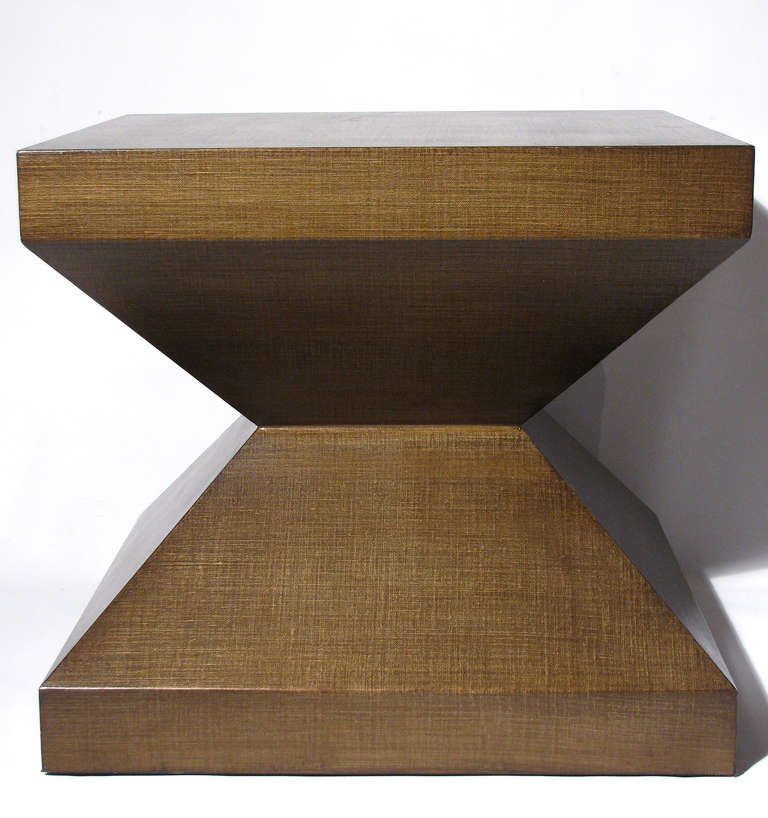 A pair of convex pyramid form side tables by Peter Alexander, San Francisco. Circa 1989. The custom linen-wrapped oak tables are 20