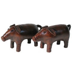 A Pair of Abercrombie Leather Piggy Ottomans