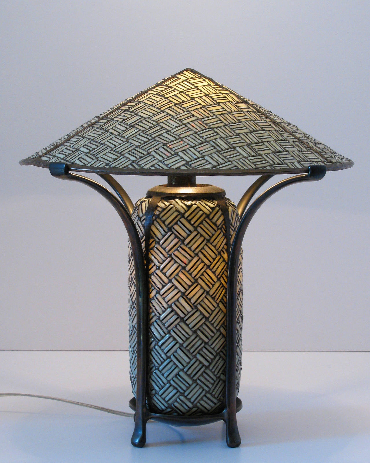 A stunning bronze and glass table lamp 