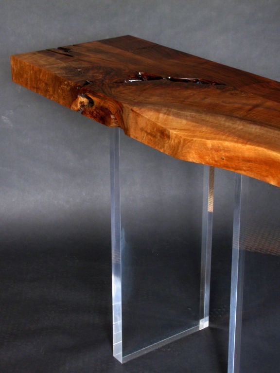 A Walnut and Lucite Console 1