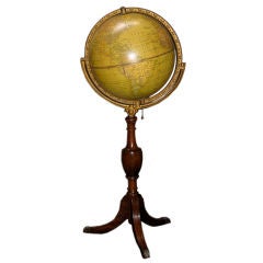 A Illuminated 12" Globe on Walnut Stand