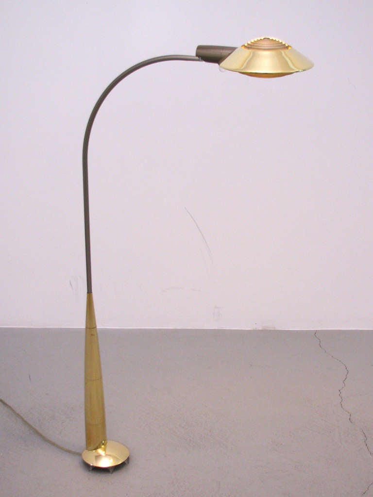 A stunning example of a vintage Cedric Hartman floor lamp, number 91CO. This combination of polished brass and gunmetal finish steel was a custom made lamp designed by Hartman for a prominent client in Pebble Beach, California. Signed at base,