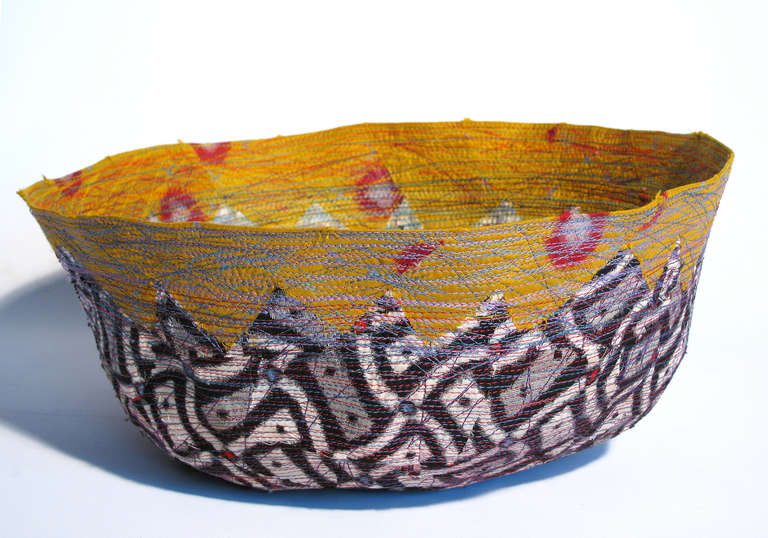 A textile vessel by artist Bird Ross. A statement found by Bird Ross; 