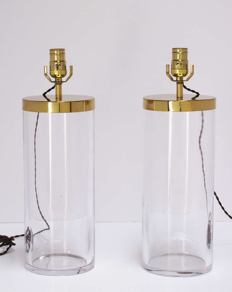 A pair of cylindrical-form Murano glass with solid brass caps table lamps. Circa 1970's. Each lamp has been rewired with dark brown twisted cord. Height measurement is 27
