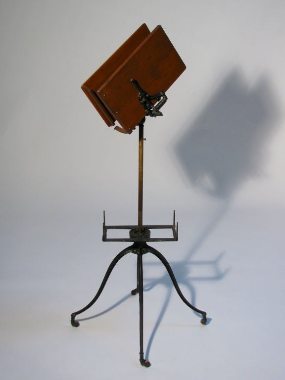A folding bookstand, perfect addition to your library or near an armchair. Made by the L.W. Noyes Company, Chicago, Illinois.<br />
Adjustable mechanism allows for large scale books for reading or display.