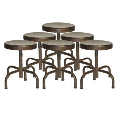 A Set of Six Industrial Stools