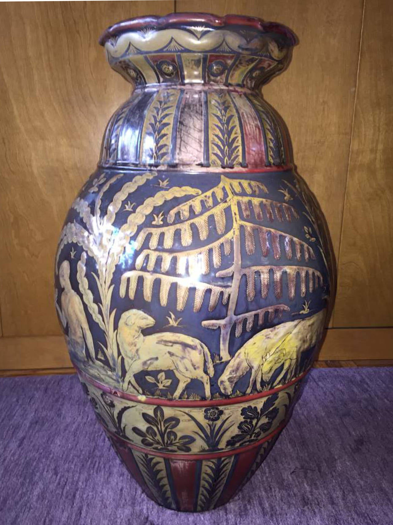 Monumental example, likely done for exhibition, with art deco figures, animals, and flora and fauna. Vase by Cantagalli circa; 1920’s to 1930's.
Approximately 26 inches high x 18 inches wide. Cantagalli's work is in such museums as the Victoria &