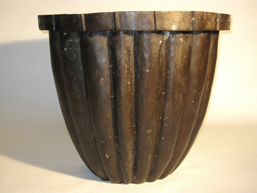 Large organic form bronze planter with a dark aged patina.