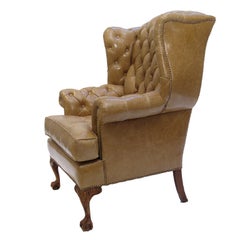 A Tufted Leather Library Chair