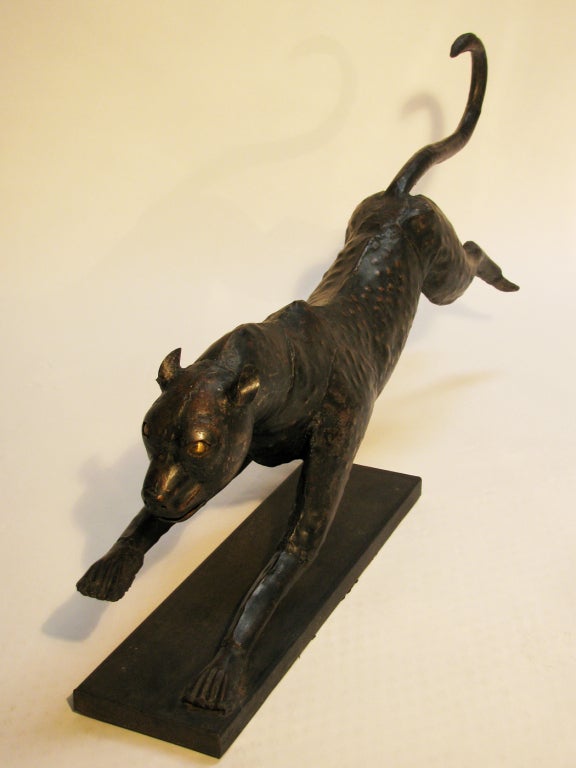 A Pair of Metal Running Cheetah Sculptures In Excellent Condition In Austin, TX
