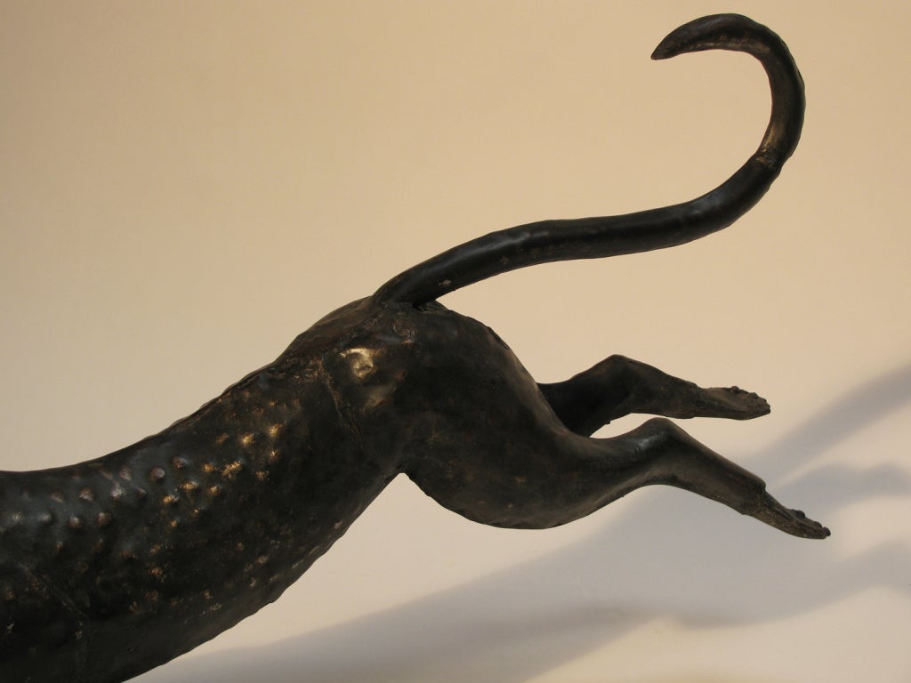 A Pair of Metal Running Cheetah Sculptures 2