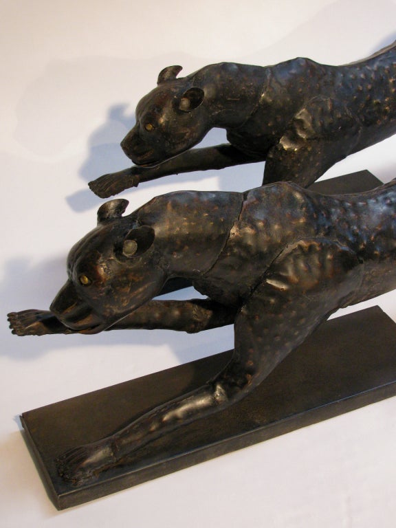 A Pair of Metal Running Cheetah Sculptures 4