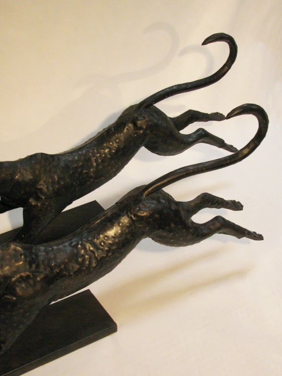 A Pair of Metal Running Cheetah Sculptures 5