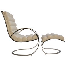 A Milo Baughman Lounge Chair 
Ottoman