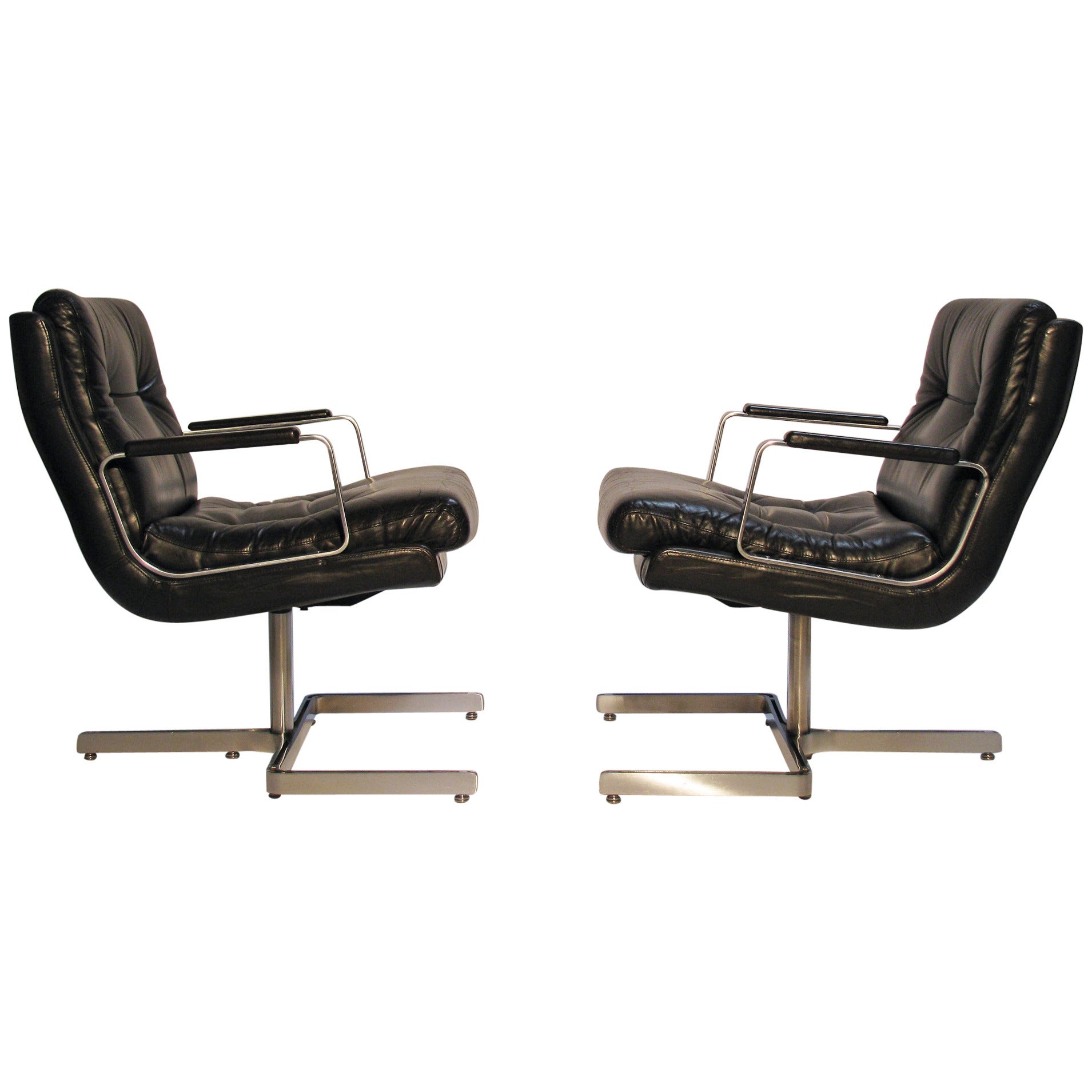 Pair of Leather Lounge Chairs by Raphael For Sale