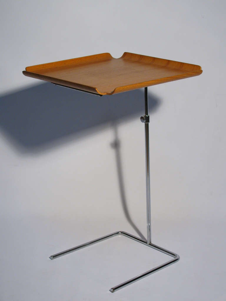 George Nelson for Herman Miller adjustable tray table. This out of production example has a bentwood oak top with a chrome plated steel base. Excellent original condition.