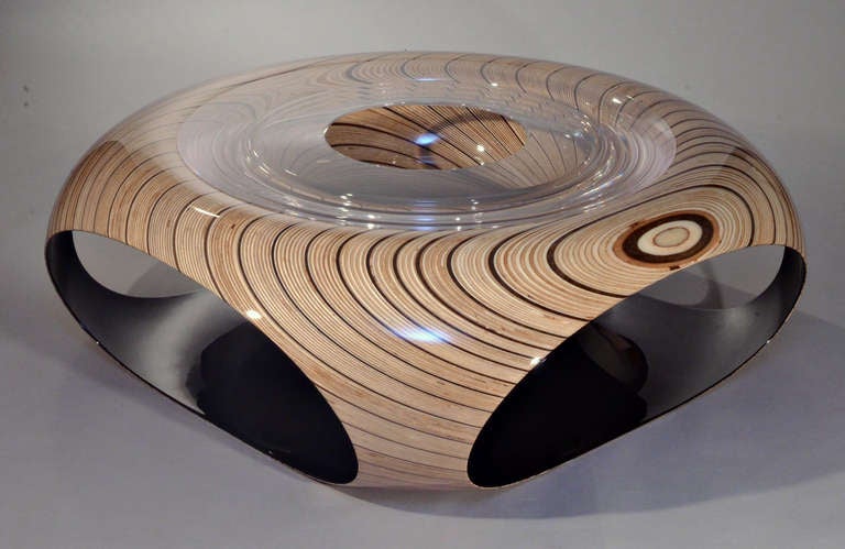 A unique and dynamic design by the Israeli design team of Iftah Geva and Gal Goldner.  Over 3 years in the making, this coffee table is a tour-de-force of sculptural furniture, exploring and pushing the limits of current technology. The lamination