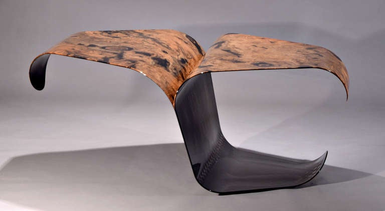 A unique and dynamic design by the Israeli design team of Iftah Geva and Gal Goldner.  Over 3 years in the making, this end table is a tour-de-force of sculptural furniture, exploring and pushing the limits of current technology.  The lamination of