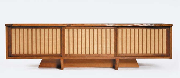 An extremely rare Conoid Room Divider with a finished back and single board top.  An elegant and very uncommon form that is signed and dated by George Nakashima.