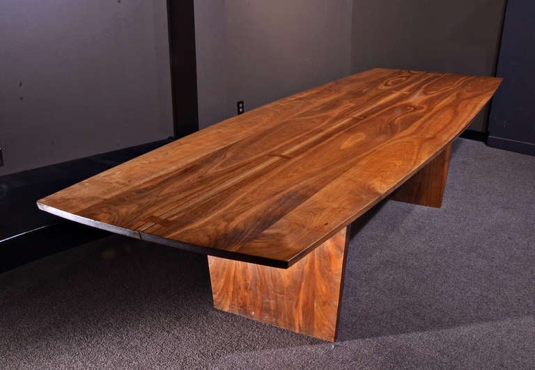 Rare, spectacular, highly figured American black walnut boat-shaped dining table/conference table