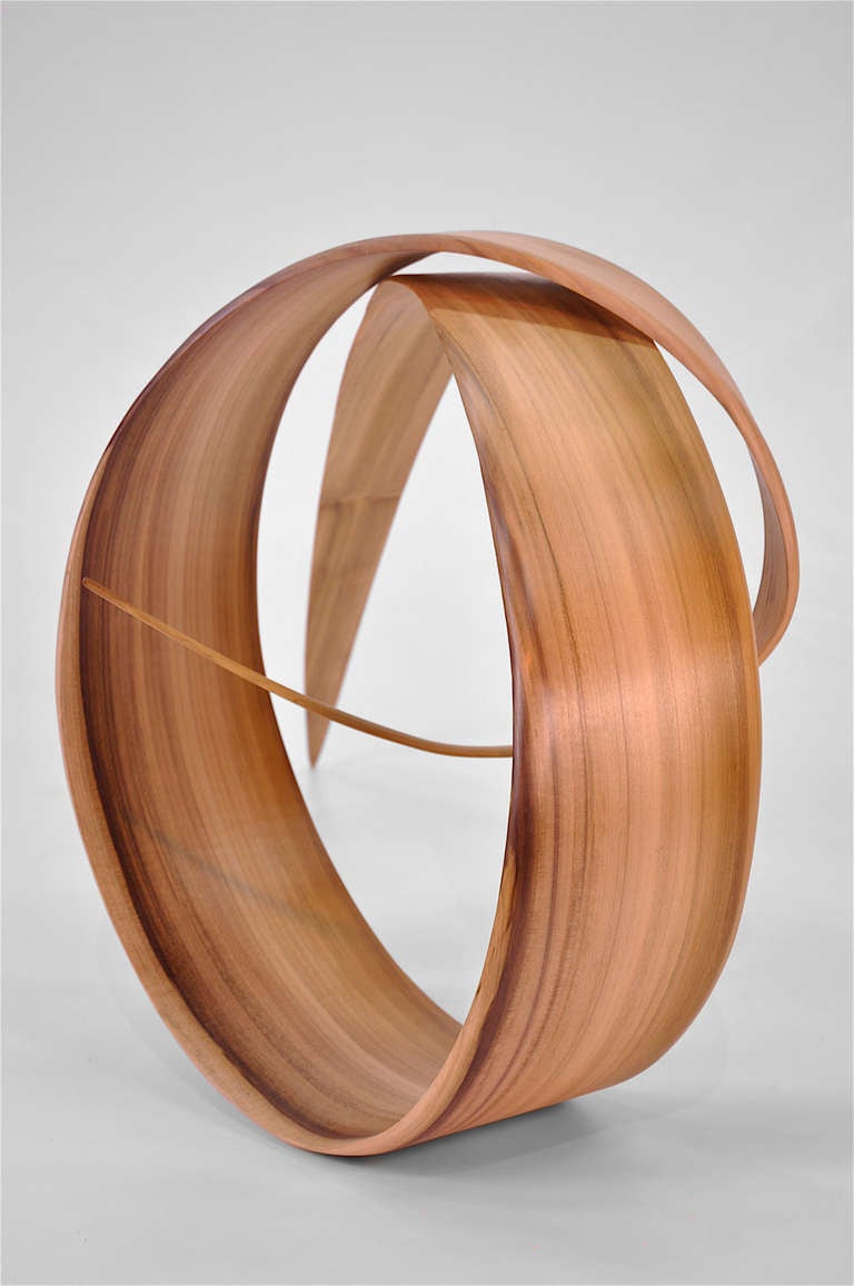 Unique sculpture designed by Richard Lazes using his patented technique for steam bending wood
