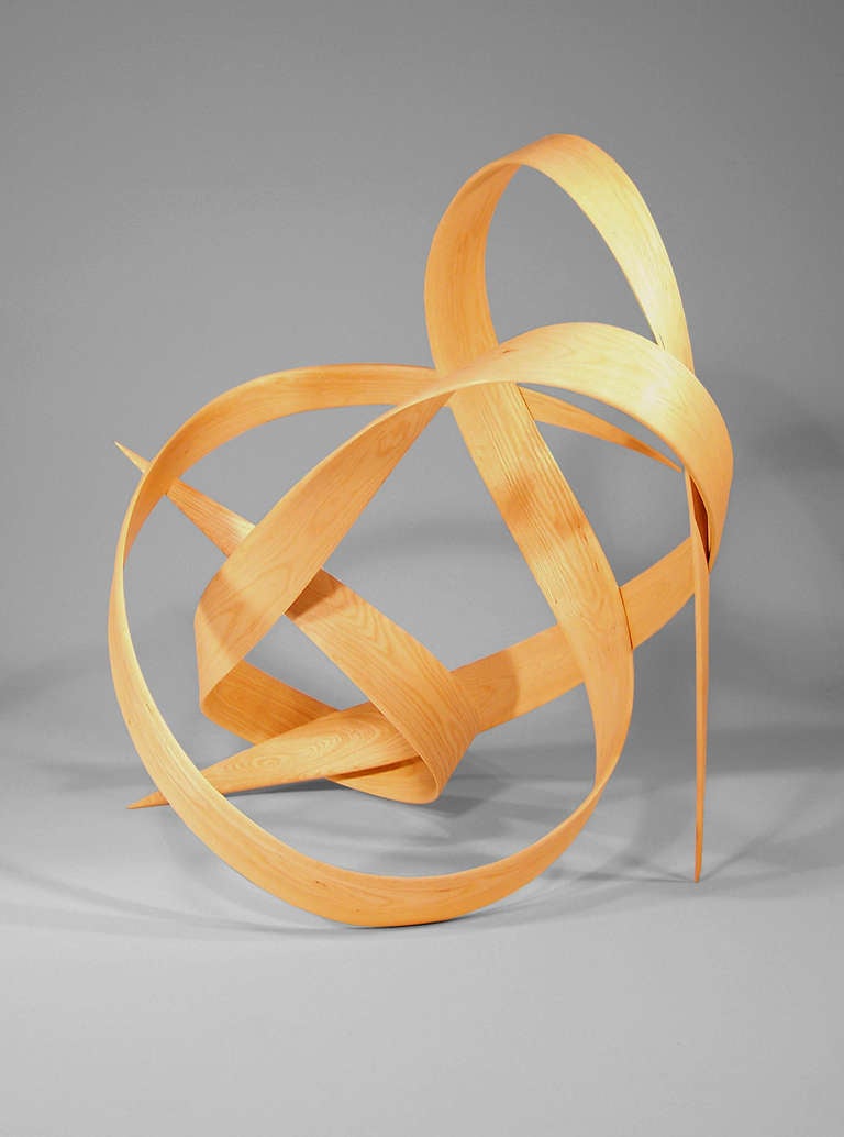 Unique sculpture designed by Richard Lazes using his patented technique for steam bending wood
