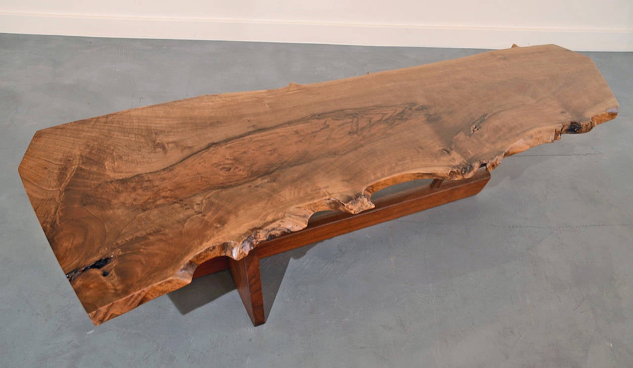 Rare, highly figured Persian walnut, free-form top on American black walnut base, signed and dated 1985.