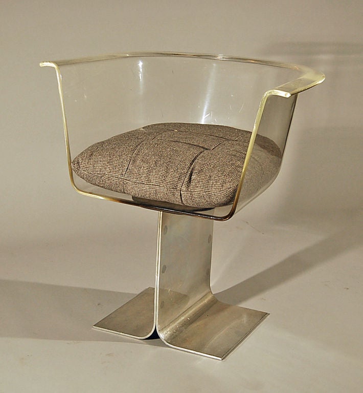 Three Lucite and Steel Chairs