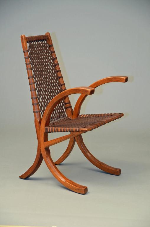 Extremely rare chair originally designed by Wharton Esherick for a tack room in Mt. Kisco, NY.  This is the early version with the wood strut.  Later versions used a metal strut.  Full provenance available