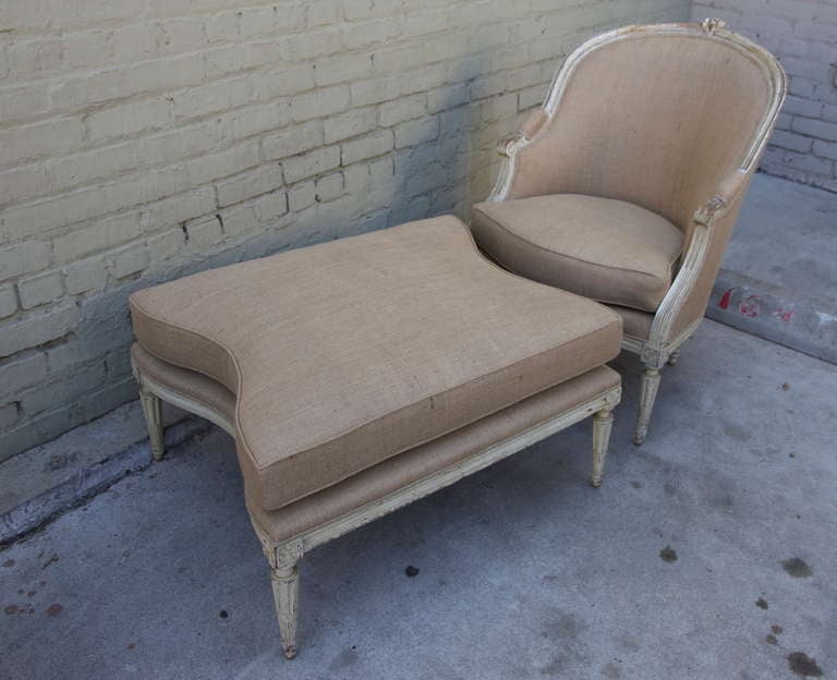 19th century French carved painted chair & ottoman newly upholstered in burlap textile with double cord detail.