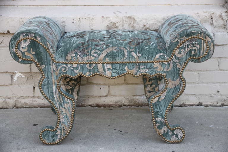 Custom hand stenciled blue velvet bench with antique brass colored nailhead trim detail.