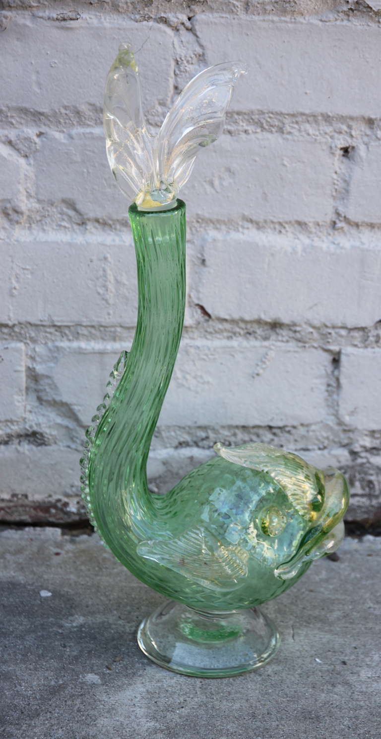 Unique Italian Murano Glass Dolphin shaped decanter in soft green and gold coloration.