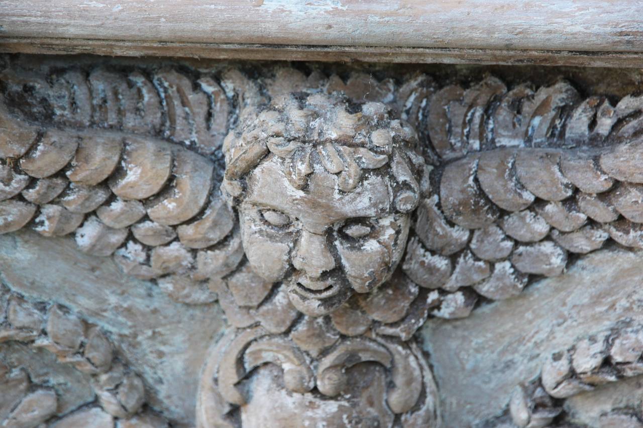 Wood Pair of Heavily Carved Italian Cherub Torchieres