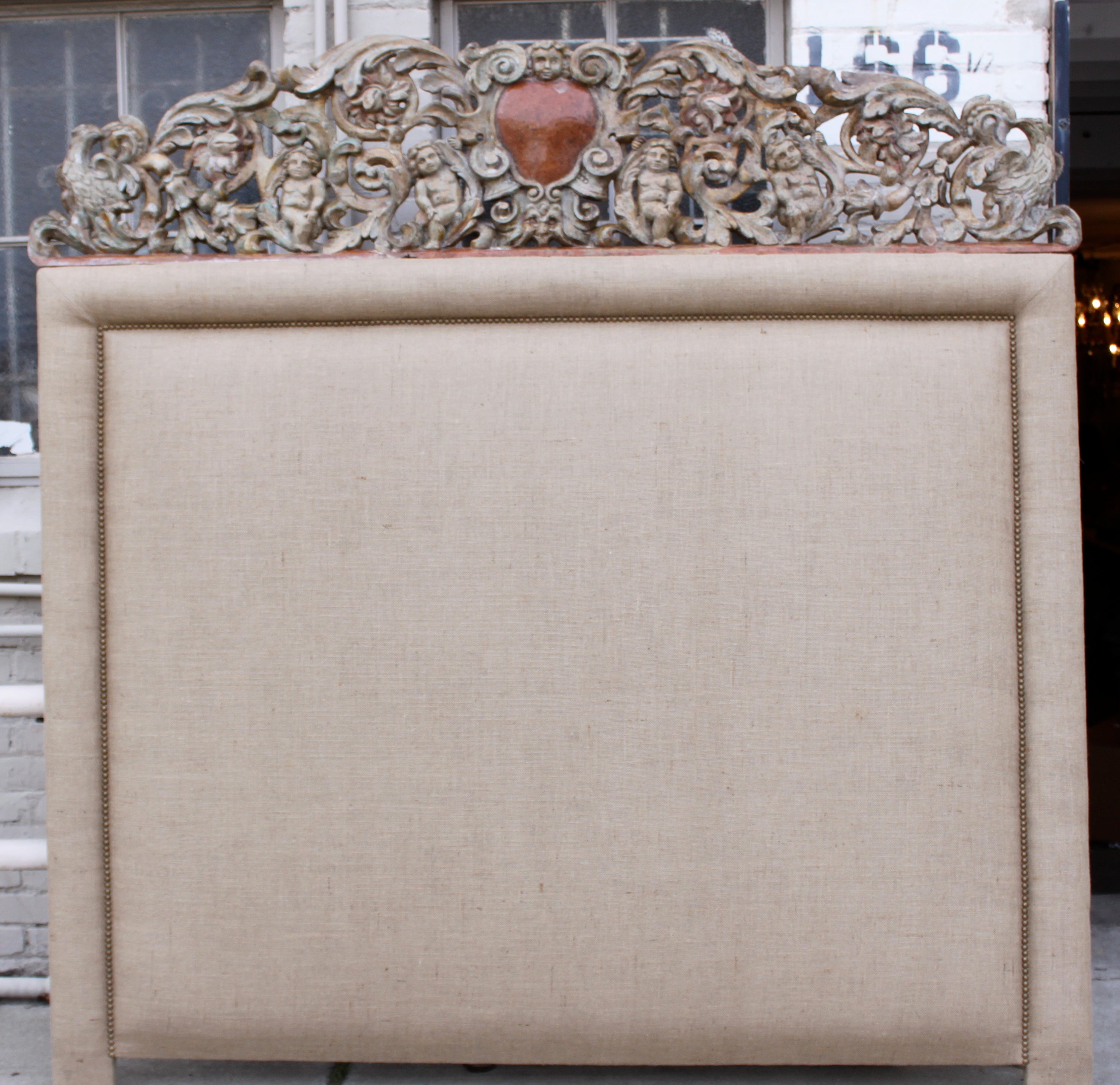Carved Cherub Burlap Upholstered Headboard
