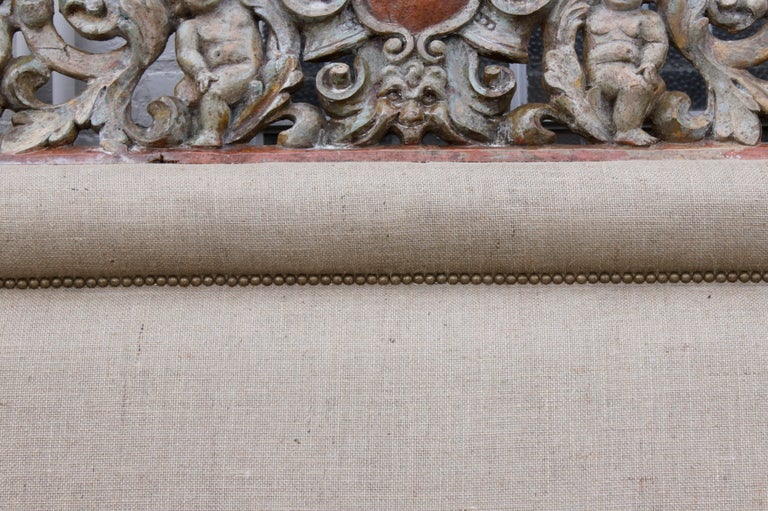 Carved Cherub Burlap Upholstered Headboard In Excellent Condition In Los Angeles, CA
