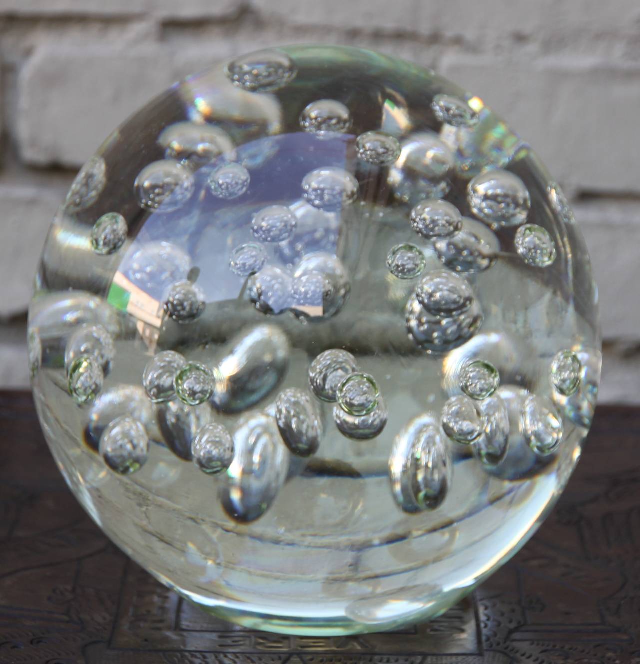 Italian Mid-Century crystal sphere with air bubbles throughout. Flat on bottom to sit on surfaces.