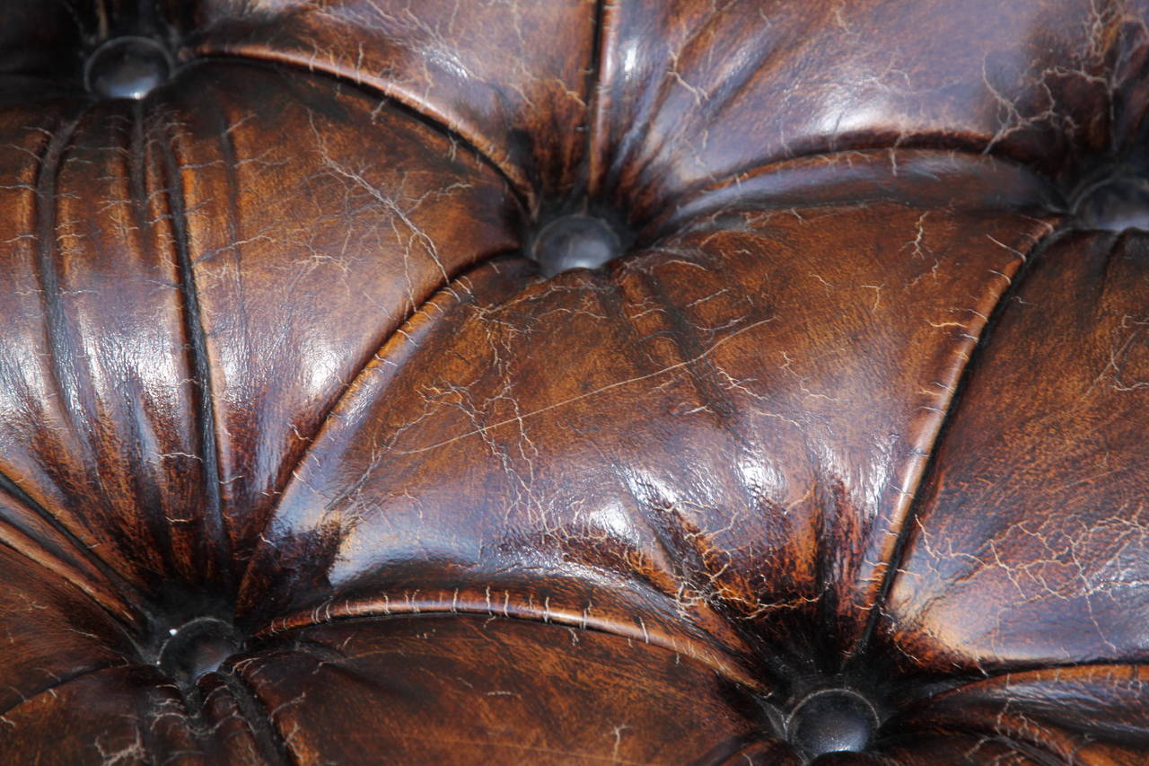 round leather tufted ottoman