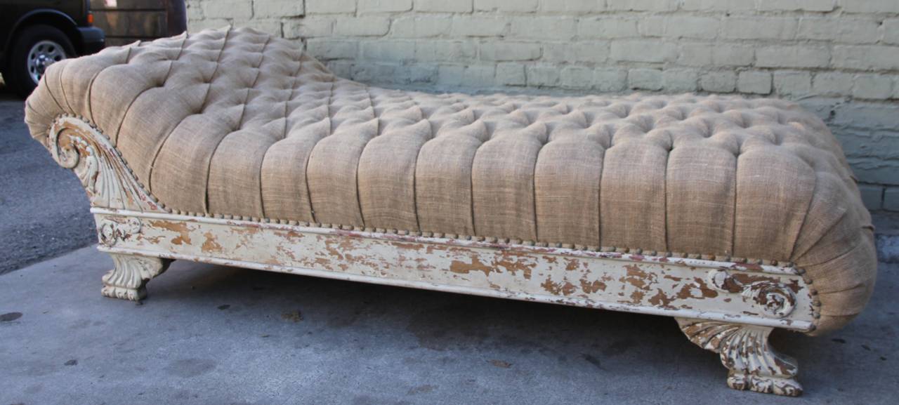 19th century Continental painted chaise longue newly upholstered in tufted burlap textile with nailhead trim detail.