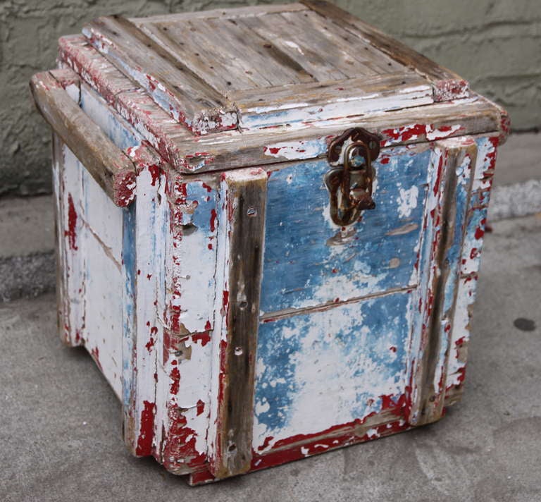 Primitive red, white, & blue painted dynamite box with handles.