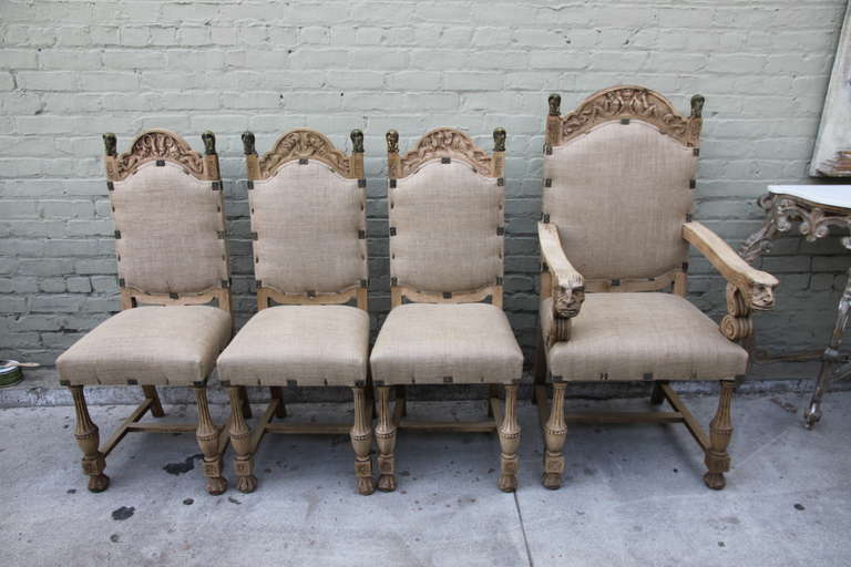 Set of (8) carved wood Spanish dining chairs, (2) arm and (6) side chairs. Distressed finish. Nailhead trim detail. Brass finials.

Side Chairs: 44