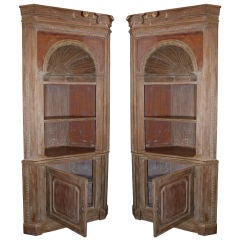 Pair of Carved Continental Painted Corner Cupboards