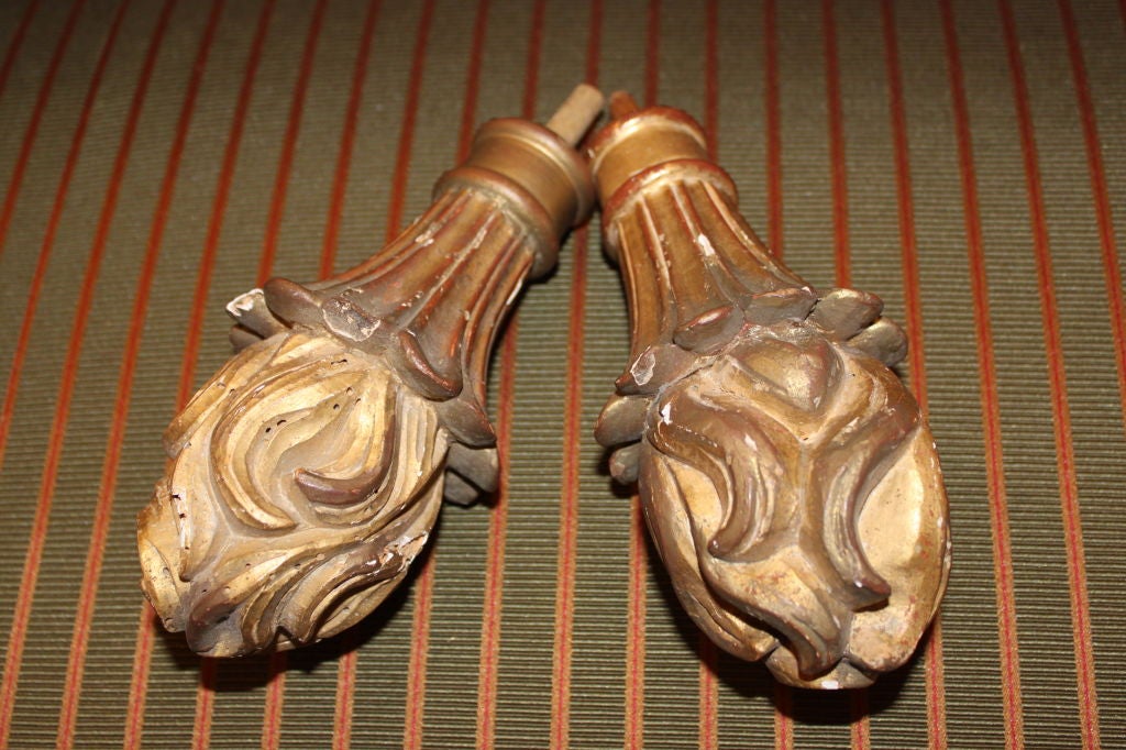 Set of (4) 19th century carved gilt wood flame finials.  These would be perfect at the end of a drapery or tapestry rod.
