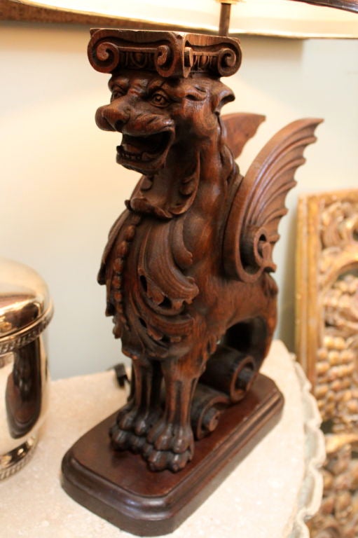 Pair of Carved Griffin Lamps with Parchment Shades C. 1930 In Excellent Condition In Los Angeles, CA