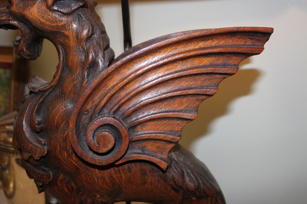Wood Pair of Carved Griffin Lamps with Parchment Shades C. 1930