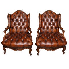 Antique Pair of French Leather Tufted Wingback Fauteuils