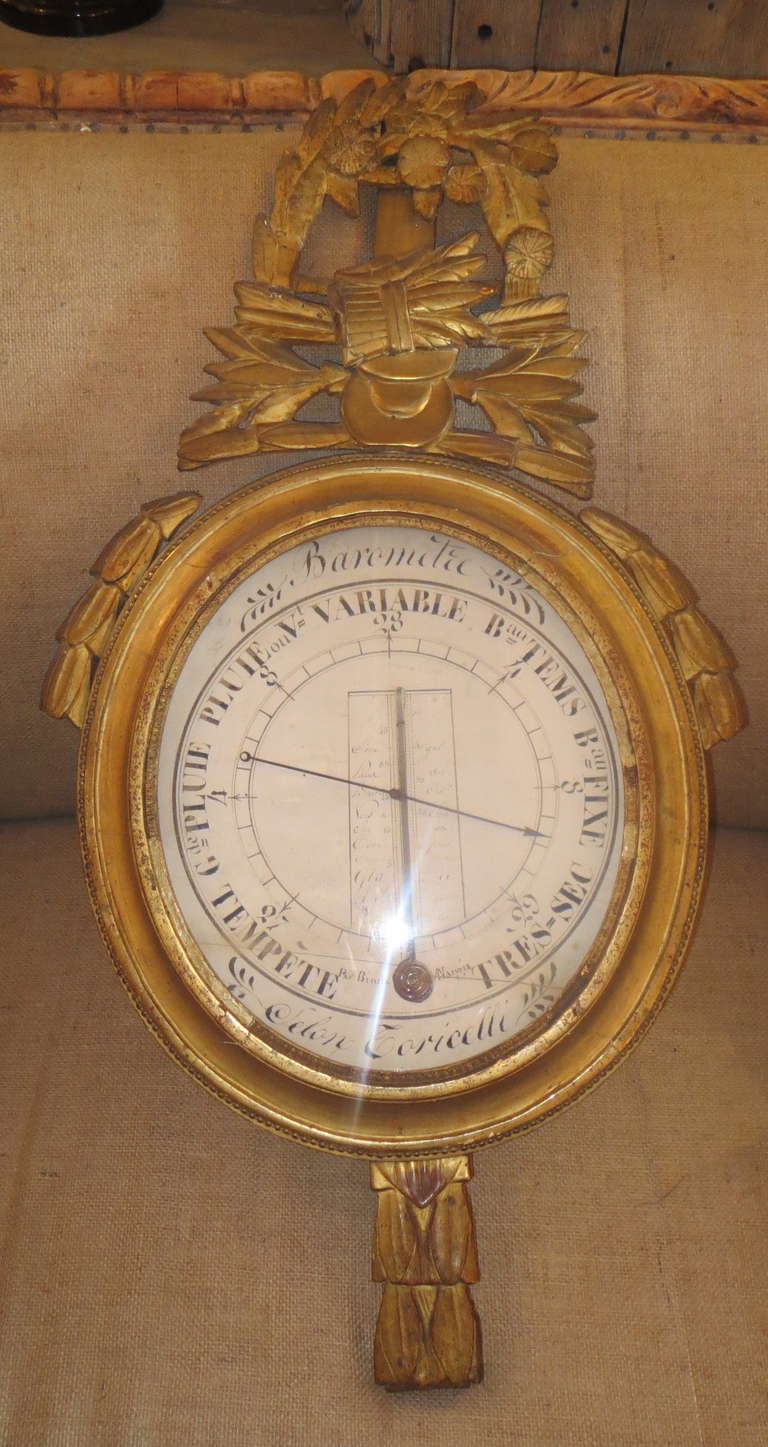 Early 19th century gilt wood barometer.
